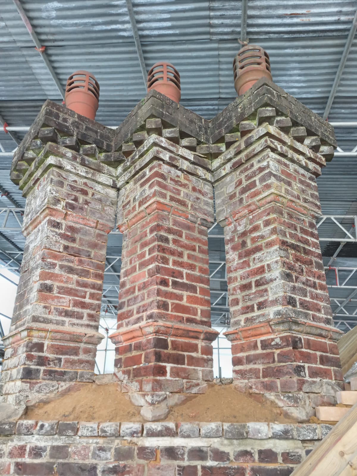 Three period chimney stacks under restoration